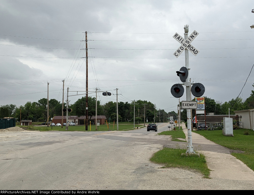 Looking south at both out-of-service ex-CGW RR crossings on Frederick Avenue